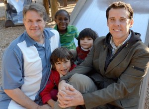 Jeff Kurtti and Ken Martinez enjoy a local playground with their boys