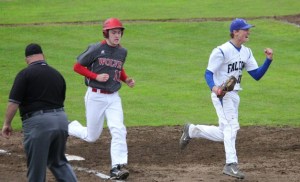 Falcon junior pitcher Charlie Patterson celebrates after making the final out at first base to claim the first District 1 title in at least three decades over Coupeville on May 10.