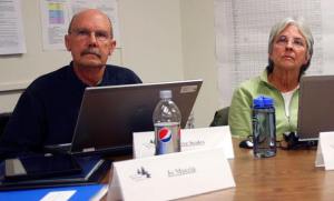 South Whidbey School Board members Steve Scoles and Linda Racicot listen to a presentation from the South Whidbey Youth Football Association during the May 23 business meeting. The youth football teams may be an option for middle school aged students to play