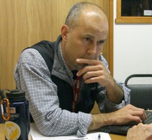 A Veterans Administration representative walks a local veteran through the benefit application process.