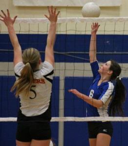 Falcon senior Haley Viers tries a tip kill past Granite Falls senior Miranda Prausa  during South Whidbey’s final Cascade Conference game of the year. South Whidbey won 3-0 on Senior Night