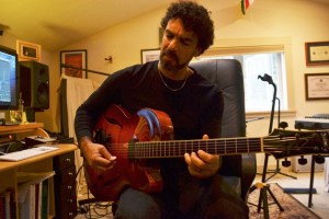 Troy Chapman practices a piece from his new album “Time and the Hours.” The music features layers of sounds from an array of instruments he created with the Troy Chapman Group.