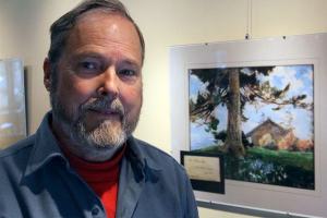 Lee James with one of the Pratt collection pieces of art