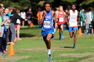 Falcon junior cross country runner Justin Gonzales reaches the final stretch of the Bellevue Invitational on Sept. 26.