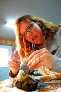 Whidbey Audubon Society volunteer Kelly Zupich works on a bird specimen in taxidermist Matt Klope’s Oak Harbor studio for the Bird in Hand exhibit at Greenbank Farm.