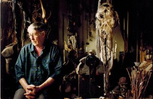 A picture of the late John Braun depicts the well known South Whidbey artist sitting with some of his works before his death in 2002. To help raise money for a school art program