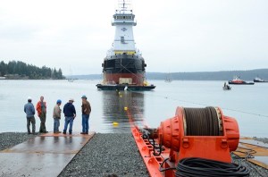 Nichols Brothers officials look out at the Nancy Peterkin