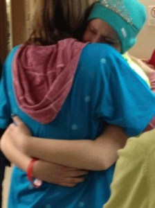 Nichol Zalewski gets a big hug from her mom