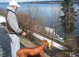 Eric Levine and his dog Angel look down at the landslide and emergency personnel minutes after the event occurred. “Whoa