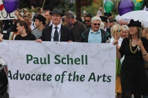 George Henny marches Thursday in Langley with hundreds of others to honor the late Paul Schell.