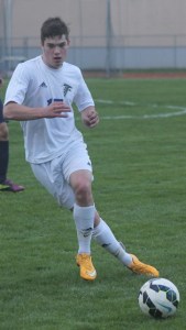 Jeff Meier passes against Cedar Park Christian earlier this season. He has scored three hat tricks thus far after recording his most recent three-goal game against Sultan on April 13.