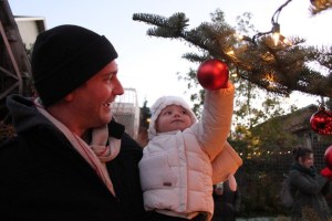 Eric Palmquist holds his 13-month-old daughter