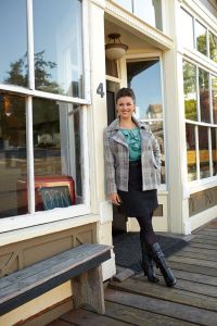 Clinton native Karla Gilbert poses on Front Street in Coupeville for maurices clothing store.
