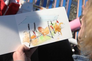 Sue Van Etten sketches some chickens that live at Island Recycling Center in Freeland.