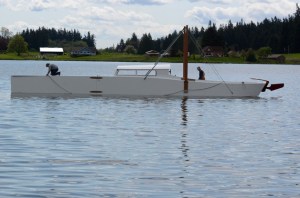 Master boat builder Brad Rice secures the bow of the folding boat he made for Bob Kertell. He’s moving to Europe and needs a boat that would fit into a 20-foot container.