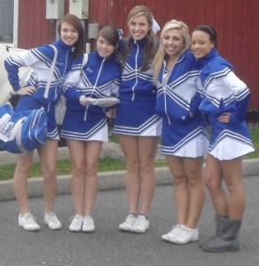 The South Whidbey cheer squad gathers for a photo outside the Roller Barn during a recent outing with foster kids.
