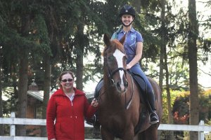 Kelly and Emma Scotthanson with Saturday’s Song. Scotthanson