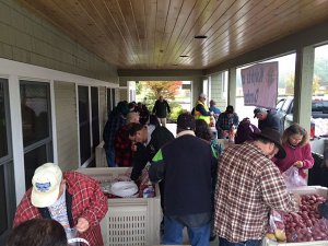 Volunteers bag potatoes at the 10th annual potato drive
