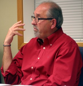 Langley Mayor Larry Kwarsick tells the city council about the 2013 budget.
