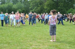 More than 100 people showed up to rehearse for a flash mob that was filmed on First Street as part of the Langley Loop music video.