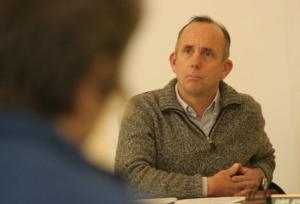 Port Commissioner Curt Gordon listens to public testimony before Wednesday's vote on a purchase offer on the Dorothy Cleveland Trail property.