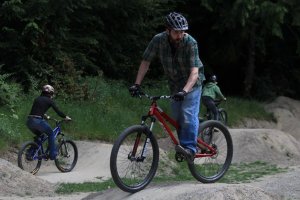 Bicyclists hit the rollers at the new pump track May 19 at Community Park.