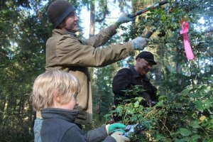 Owen Rae helps his father