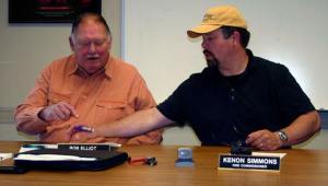 Commissioners of South Whidbey Fire/EMS Bob Elliot and Kenon Simmons sign the papers that will put a levy to a public vote in November.