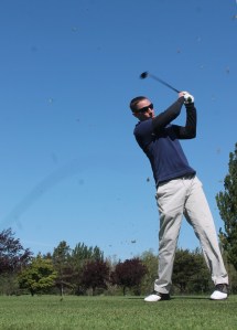 Ray Hass chips on the 11th fairway at Useless Bay Golf & Country Club on May 7. The chief stationed at NAS Whidbey Island took advantage of a free round at the members-only club.