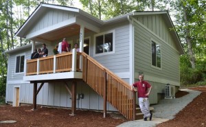 Homeowner Mark Stephens stands in front of his newly built home in Freeland. The home is built by the homeowner and volunteers from Habitat of Humanity of Island County.
