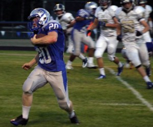 Falcon junior Cooper Nichols evades a swarm of Eagles during a kickoff return in the second half of Friday’s 35-21 loss. Nichols had plenty of kick returns after Cedar Park’s coaches chose to kick away from junior Nick Bennett.