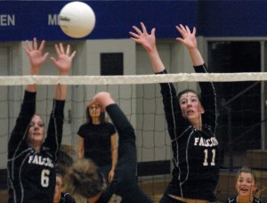 South Whidbey sophomore hitter Haley Viers and senior middle Hannah Calderwood miss blocking a kill by Cedarcrest senior hitter Kailyn Campbell on Tuesday.