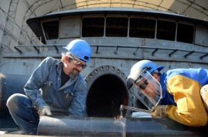 Tim Neraf assists Michael Christensen