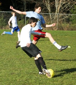 Falcon Dean Freundlich goes airborne as he tries to get the ball away from teammate Noah Moeller in a practice session last week.