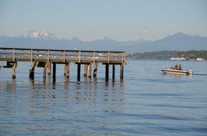 Boaters motor past a small pier located in Glendale