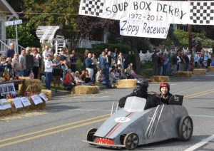 Racers hit the finish under the Zippy Raceway banner.