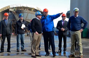 Gov. Jay Inslee (center) toured Nichols Brothers Boat Builders in Freeland on Tuesday
