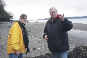 Mike McVay scopes out a public beach access near his home in the Baby Island neighborhood with Marjorie Montaperto of Freeland. “We want to get everybody working on something that will last