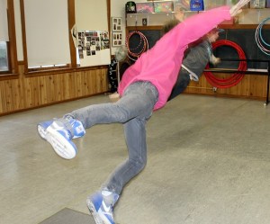 The Vanderwoods practice a dance in the studio at Island Dance.