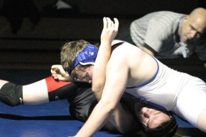 Falcon senior Jerimiah Robey pins Red Wolves 195-pounder Parker Dixon in the second round. Robey was one of only two Falcon victories against Cedarcrest on Thursday night.