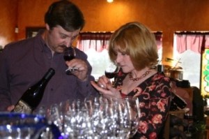 Vino Amore Wine Shop owners Brian Plebanek and Gail Liston spend some time at the store getting ready for a wine tasting with some of their customers.