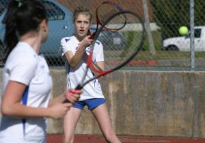 Katrina Layton returns a forehand to Lakewood's top doubles team on Monday afternoon. The Falcon sophomore was partnered with senior Tessa Chiarizio for the first time this season.