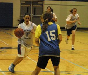 Falcon Ashlinn Prosch crosses center court