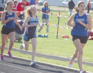 Jaime Rodden hits the 100-meter straightaway at the Cashmere Invitational. Behind her two spots is fellow Falcon 800-meter racer Terra Wildon.