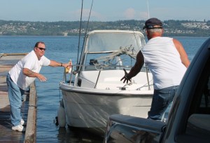 Tom Jones of Arlington throws a line to Bob Briggs