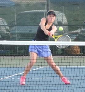Tess Radisch backhands a volley during the state 1A girls tennis tournament May 30-31 in Yakima. She and partner Amelia Weeks finished in seventh place after winning two matches and losing two matches.