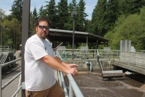 Tim Grove discusses the process for treating sewage at the Langley treatment facility on Coles Road.