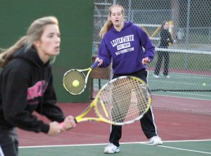 Hayley Newman returns a serve during a practice match with her teammates recently. She was partnered with senior Kalie Stayskal. Both are likely singles players this year.
