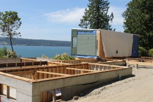 Anna Scipione’s modular home will overlook Holmes Harbor as it’s nestled near forest along East Harbor Road.