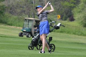 South Whidbey junior Riley Yale hits a midrange shot on hole one at Useless Bay Golf and Country Club during the Falcons’ match against Cedar Park Christian Tuesday afternoon. South Whidbey won the league title the day after